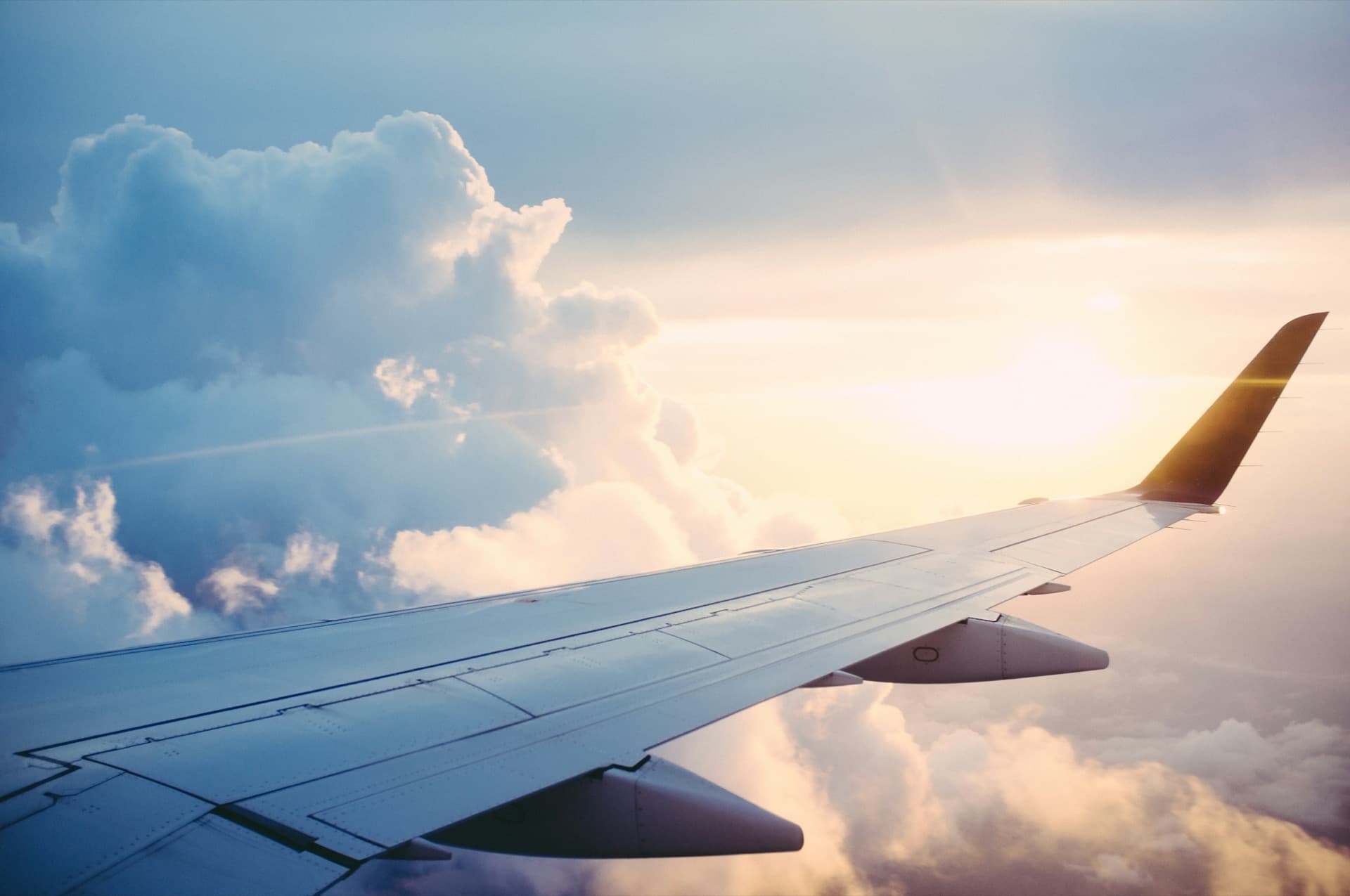 Private jet flying internationally over ocean