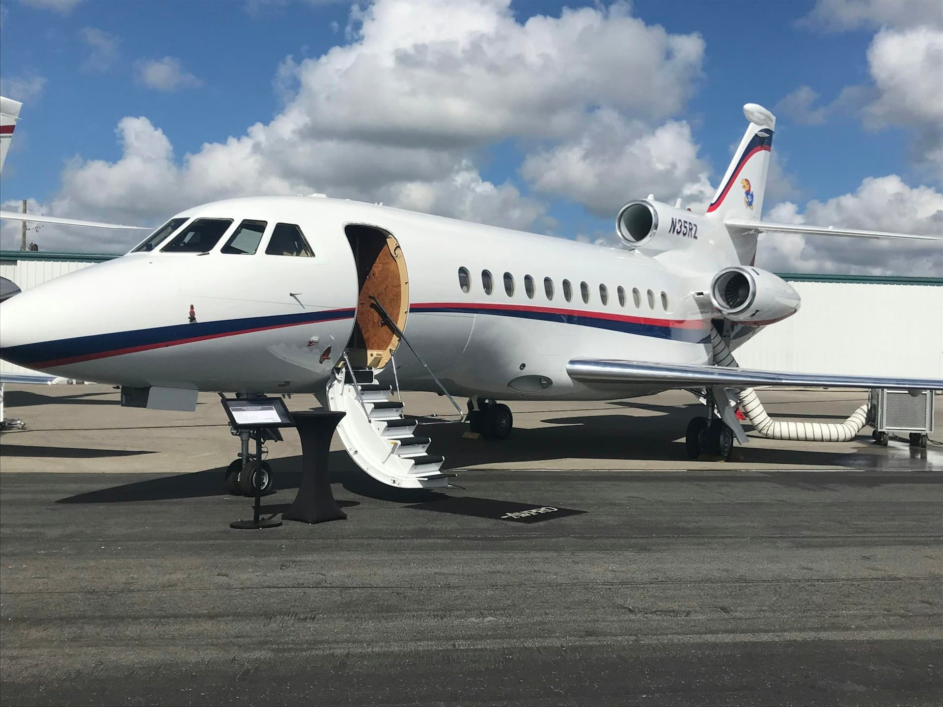 Executive private jet interior for corporate travel programs
